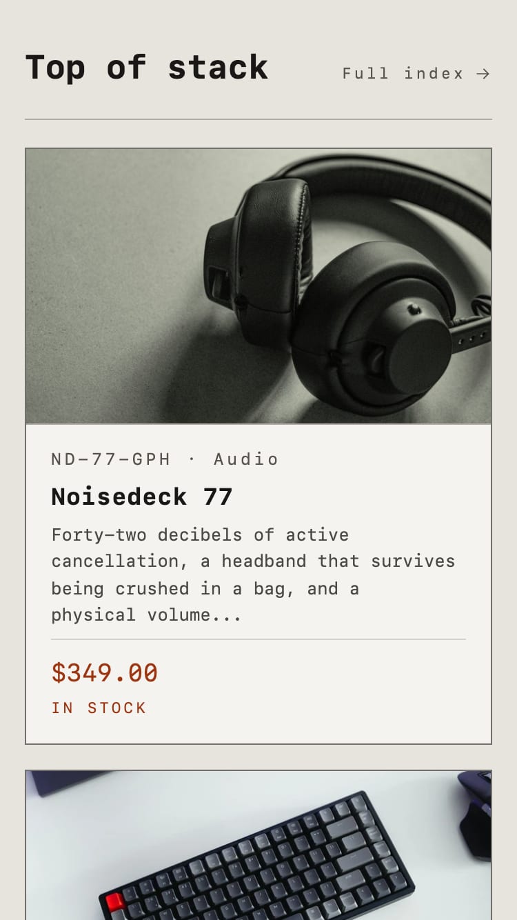 A product card on a phone in the Monolith palette: headphones, SKU, title, excerpt, price and “In stock”.